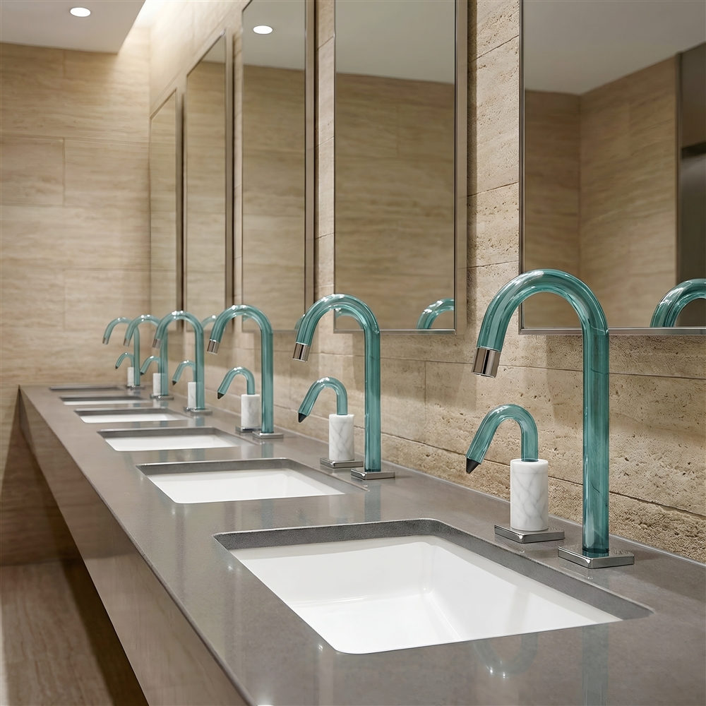 Modern corporate building restroom featuring durable sensor faucets and clean sink design