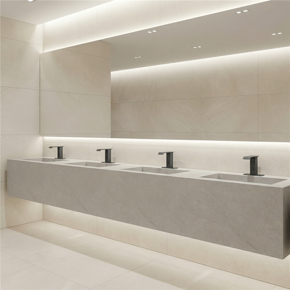 Commercial restroom toilet faucets coordinated within the architectural plumbing system